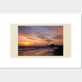 January sunrise on the beach Posters and Art